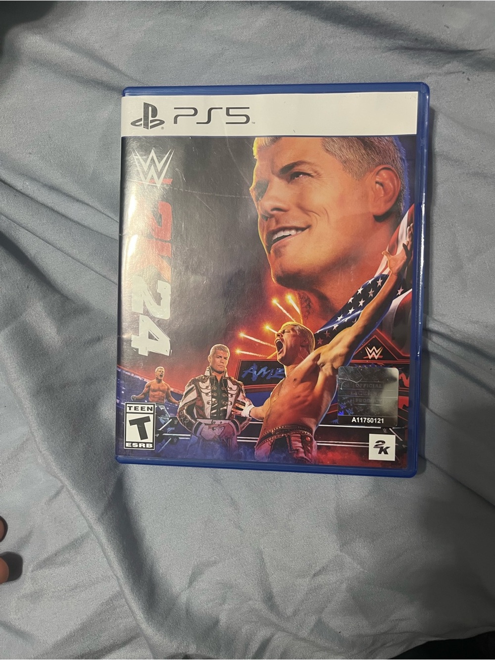 WWE 2K24 PS5 Game with Red, Blue, Black Artwork